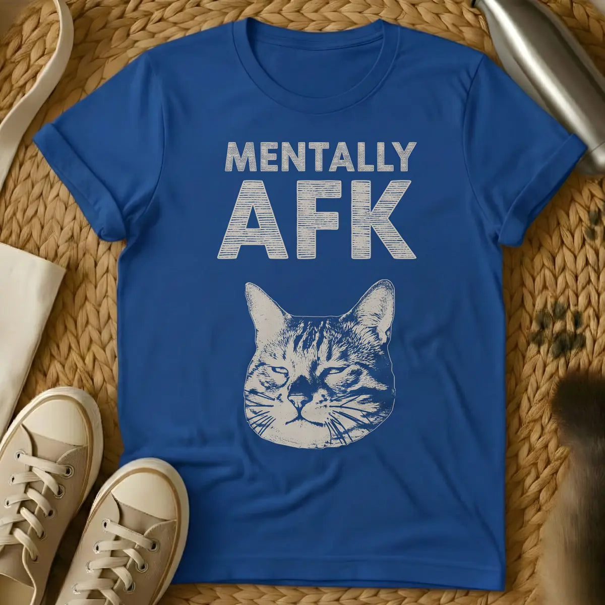 Royal - T-shirt with distressed light beige text 'MENTALLY AFK' above a matching light beige, sleepy cat's head illustration.