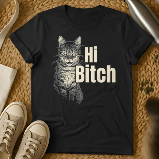 Black - T-shirt design: Engraved style tan cat with bared teeth on the left, next to bold tan text "Hi Bitch".