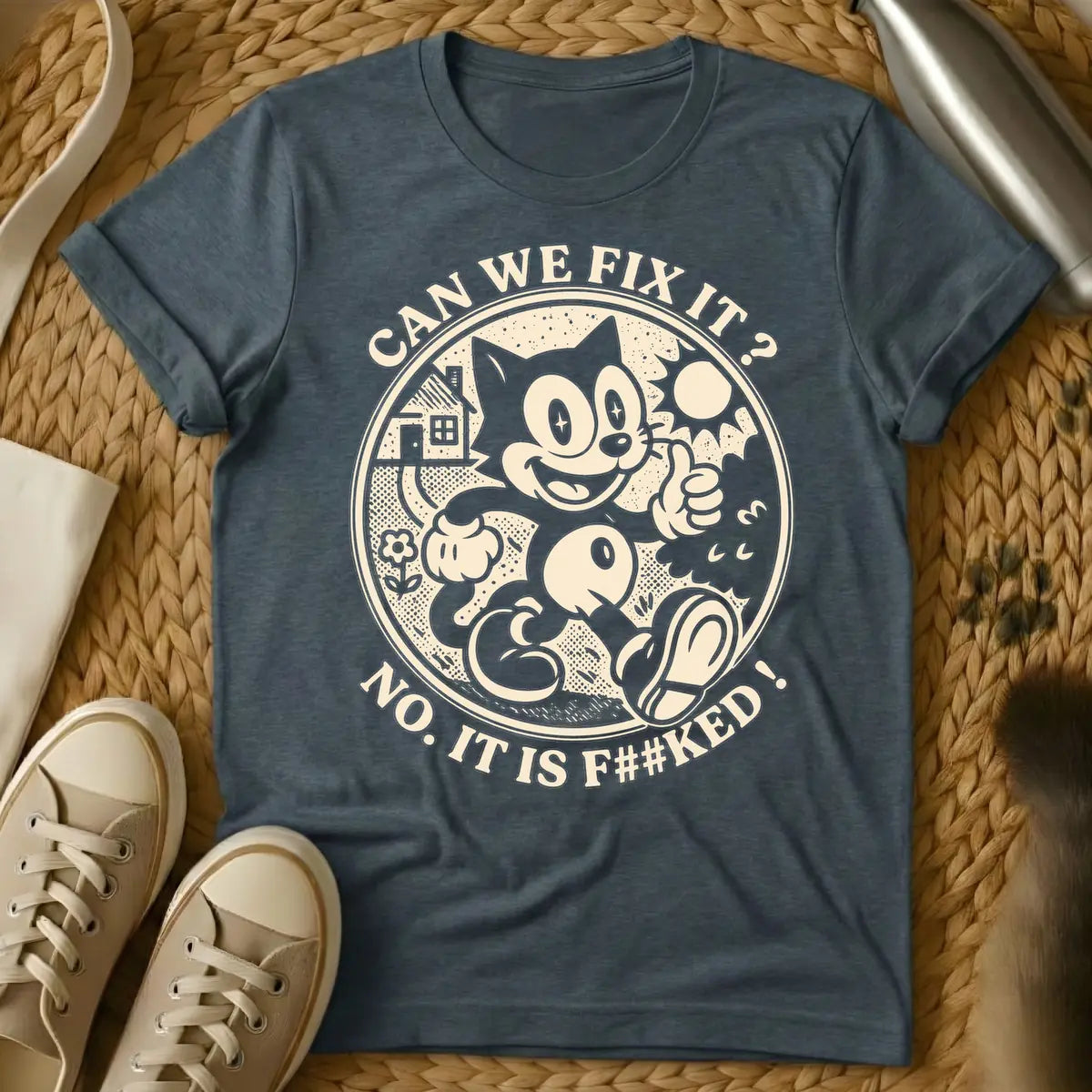 Dark Heather - Distressed cream-colored vintage cartoon cat, similar to Felix, with star-sparkle eyes, smiling and giving a thumbs up inside a circular border with a small house, flower, and sunburst. Arched text above the circle reads "CAN WE FIX IT?" and arched text below reads "NO. IT IS F##KED!".