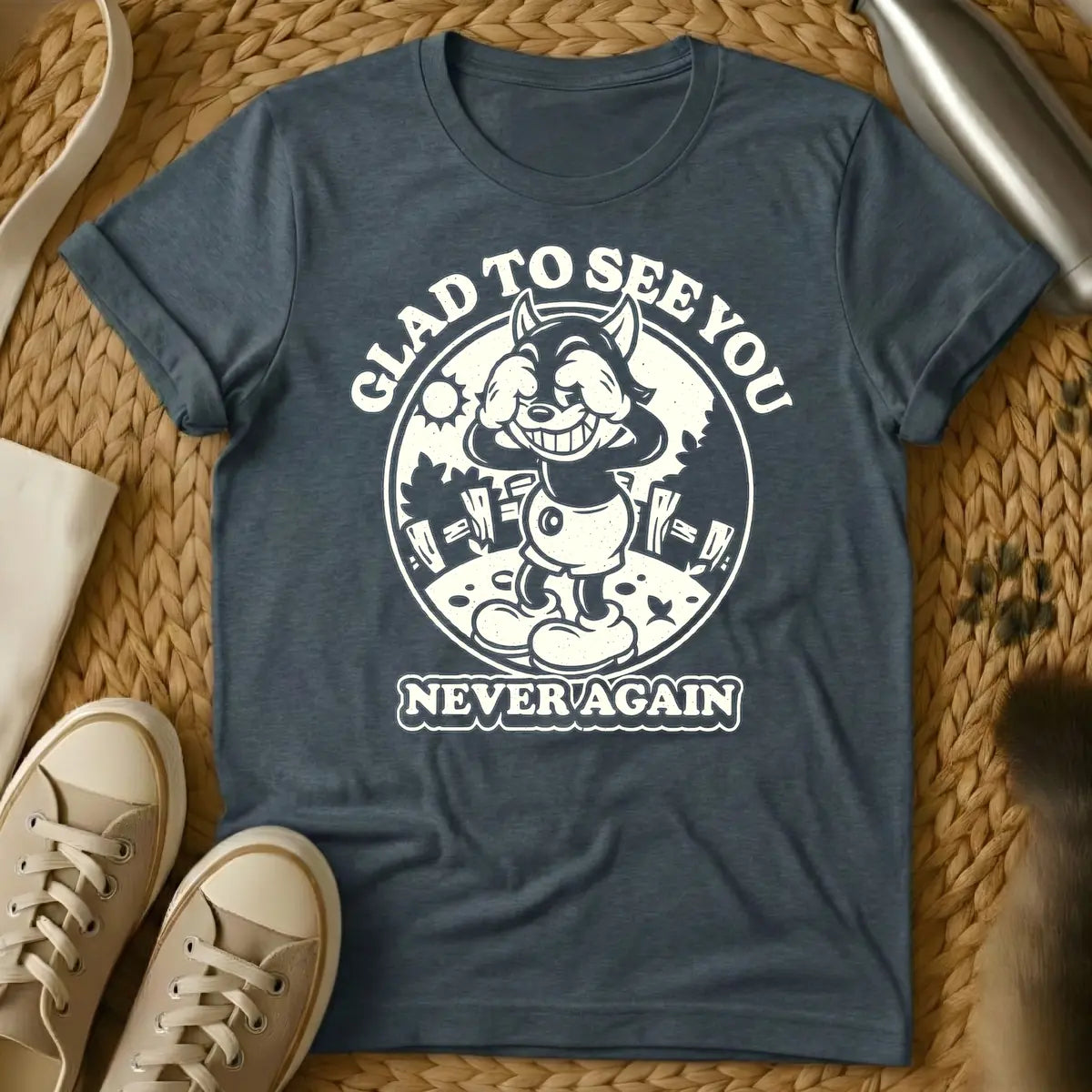 Dark Heather - Vintage style cartoon wolf character covering its eyes with its hands and grinning widely, in a circular frame with a sun and fence in the background. Arched text above the circle reads "GLAD TO SEE YOU", and text below the circle reads "NEVER AGAIN".