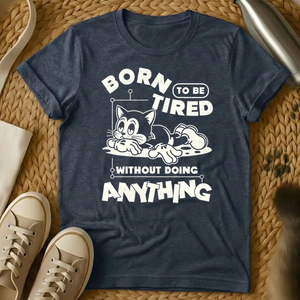 Heather Navy - Distressed cream t-shirt design featuring a tired-looking cartoon cat lying down and the text 'BORN TO BE TIRED WITHOUT DOING ANYTHING'.