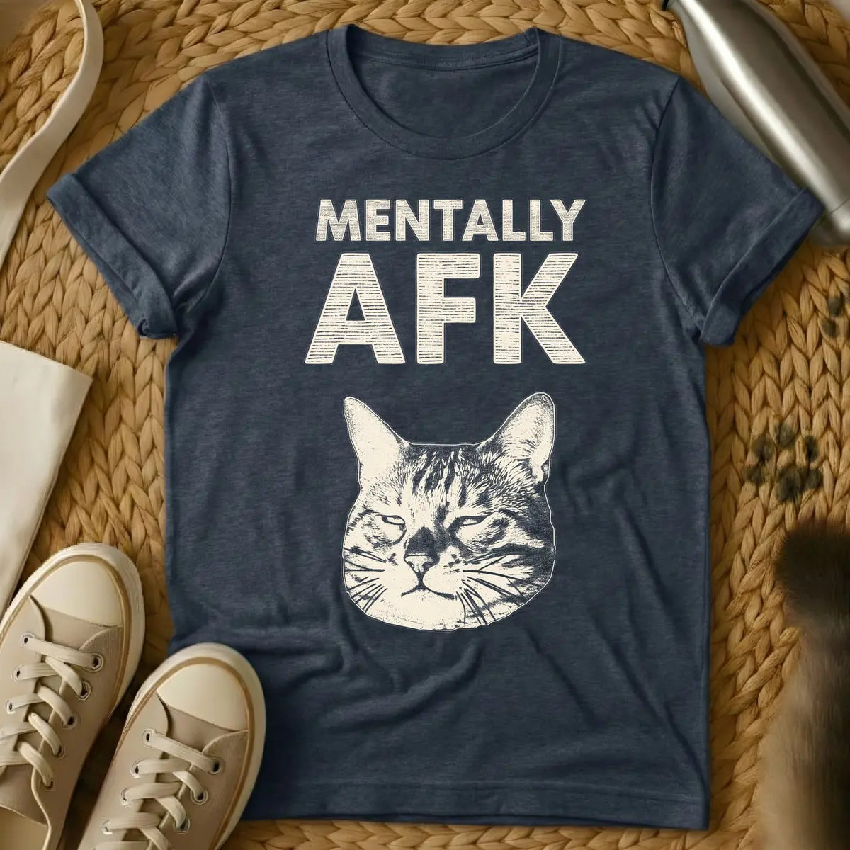 Heather Navy - T-shirt with distressed light beige text 'MENTALLY AFK' above a matching light beige, sleepy cat's head illustration.