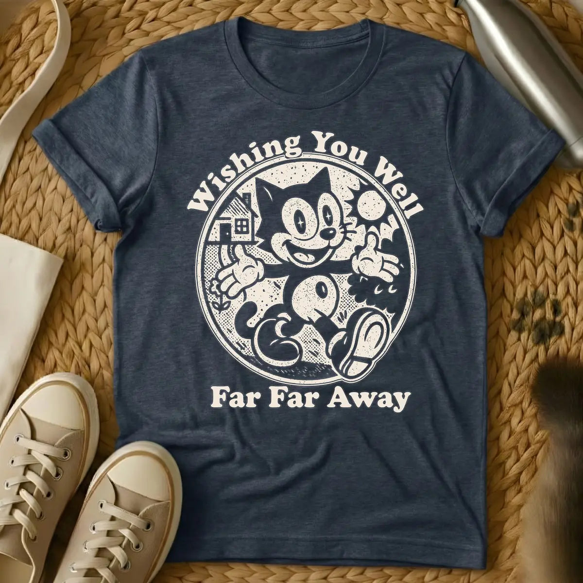 Heather Navy - Dark blue distressed graphic of a vintage cartoon cat, similar to Felix, happily walking with thumbs up inside a circle. To its left is a house and small flower, to its right a sun. Text above reads "Wishing You Well", and text below reads "Far Far Away".