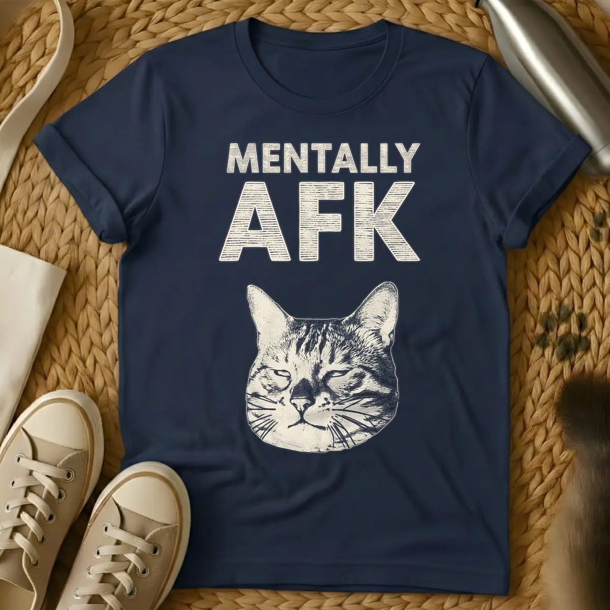 Navy - T-shirt with distressed light beige text 'MENTALLY AFK' above a matching light beige, sleepy cat's head illustration.