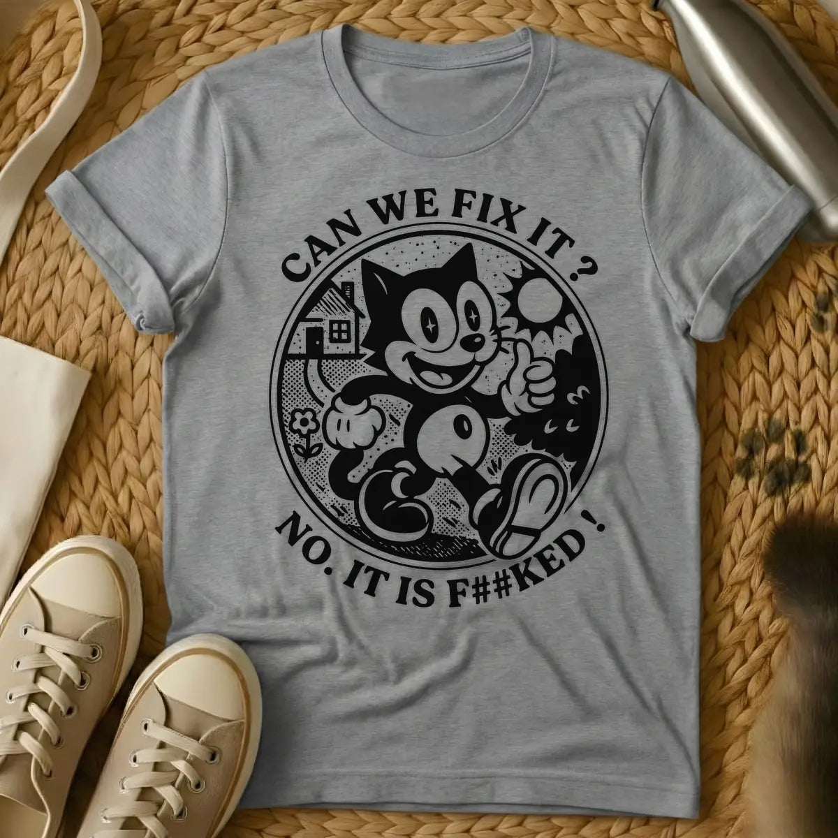 Sport Grey - Distressed cream-colored vintage cartoon cat, similar to Felix, with star-sparkle eyes, smiling and giving a thumbs up inside a circular border with a small house, flower, and sunburst. Arched text above the circle reads "CAN WE FIX IT?" and arched text below reads "NO. IT IS F##KED!".