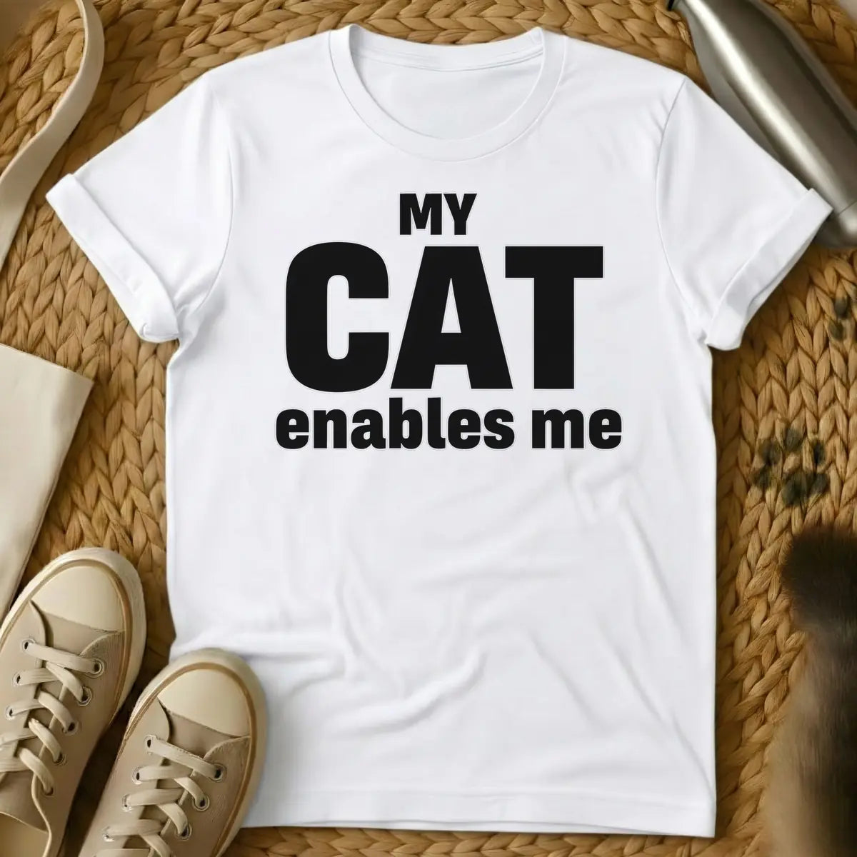 White - Black text on a white background reads 'MY CAT enables me', with 'CAT' being significantly larger and bolder than the other words.