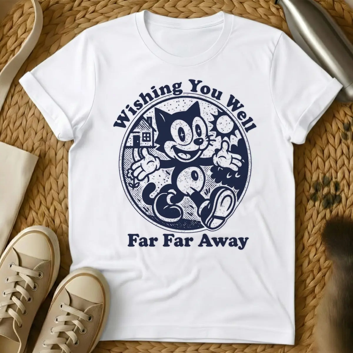 White - Dark blue distressed graphic of a vintage cartoon cat, similar to Felix, happily walking with thumbs up inside a circle. To its left is a house and small flower, to its right a sun. Text above reads "Wishing You Well", and text below reads "Far Far Away".