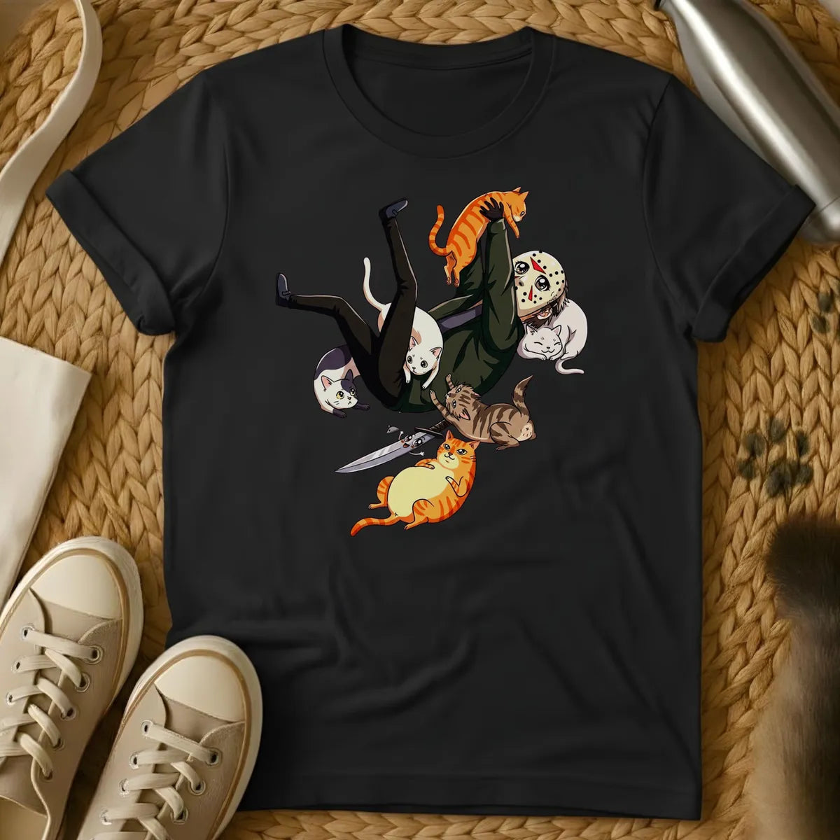Black - A person in black falling surrounded by colorful cats and a knife on a sage green t-shirt in cartoon style