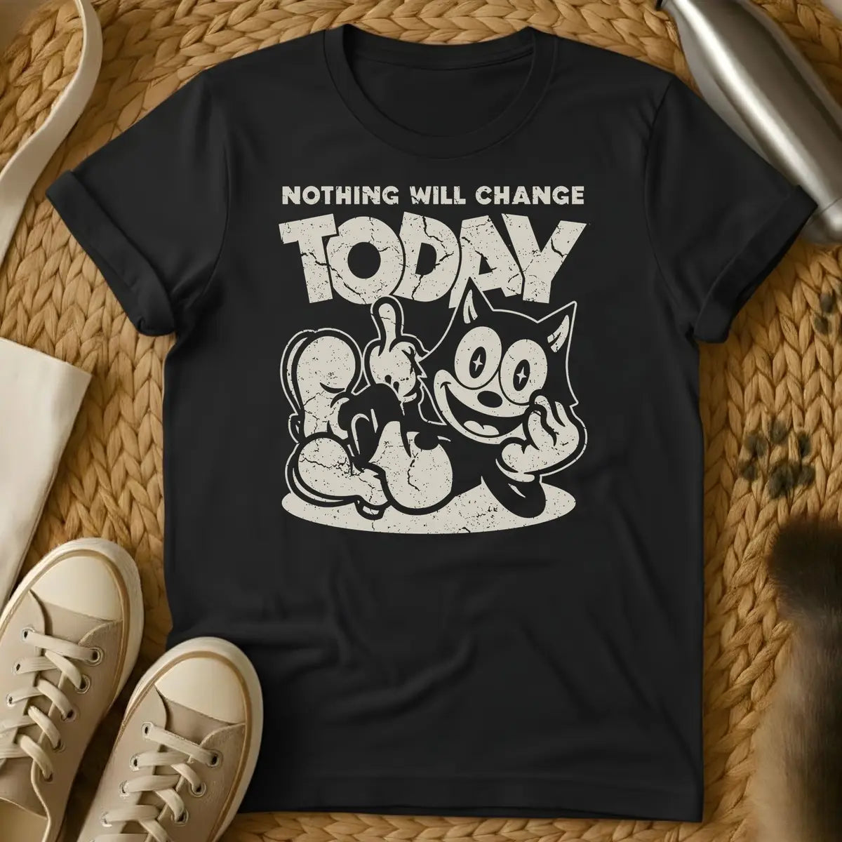 Black - Dark grey t-shirt with a grinning cartoon cat flipping double middle fingers and bold text reading Nothing Will Change Today