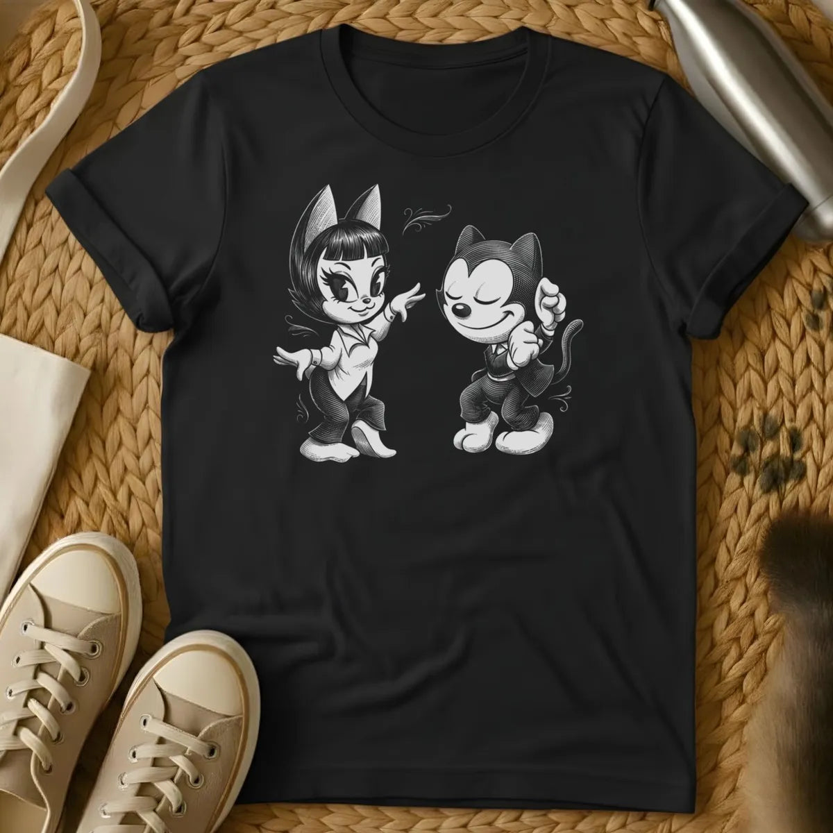 Black - Dark grey t-shirt with a black-and-white pencil sketch of two dancing anthropomorphic cats in vintage 1930s cartoon style