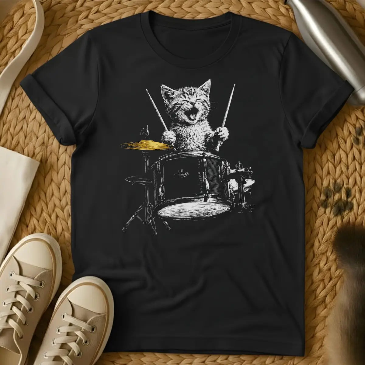 Black - Forest green t-shirt with a sketch of a happy kitten playing a full drum kit with drumsticks, mouth open, cymbal mid-crash