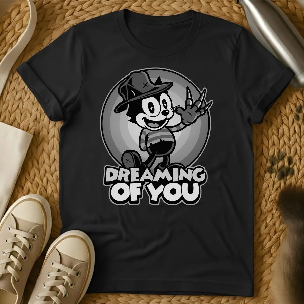 Black - Vintage cartoon cat in cowboy hat waving in front of moon with "Dreaming of You" text on sage green t-shirt