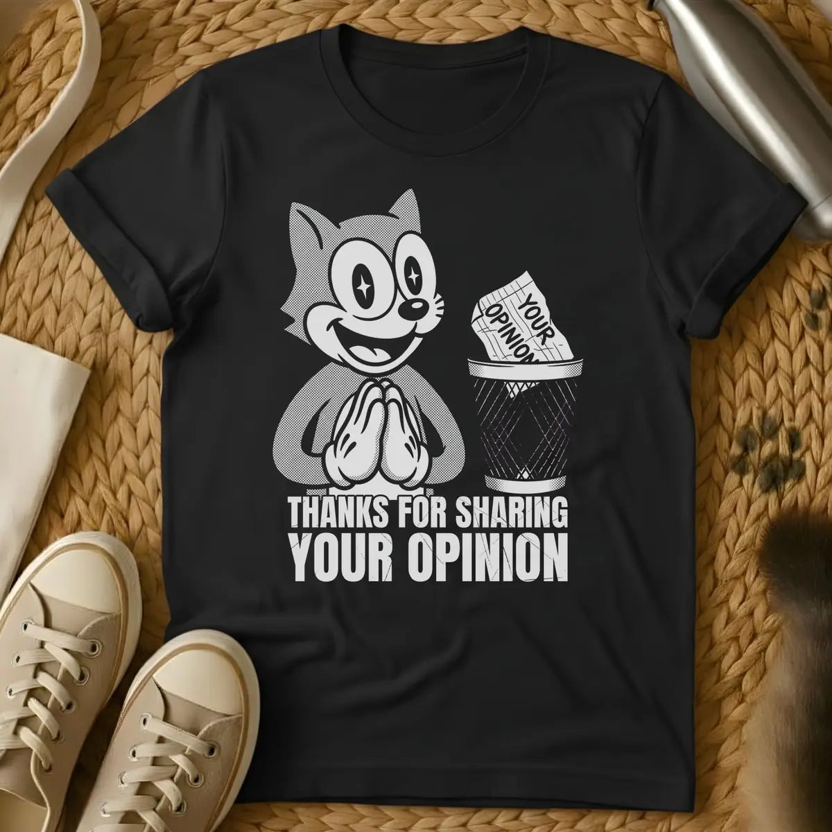 Black - Military green t-shirt with retro cartoon cat grinning as a paper labeled Your Opinion lands in a wire trash can