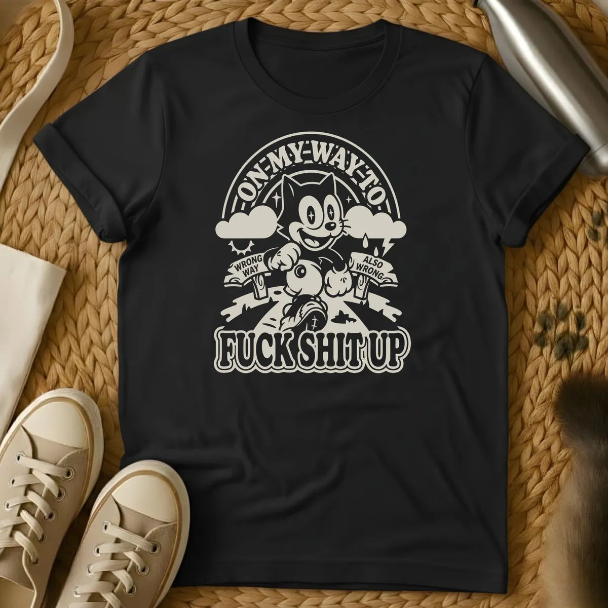 Black - Military green t-shirt with retro cartoon cat running on a forked road past Wrong Way and Also Wrong signs under a rainbow