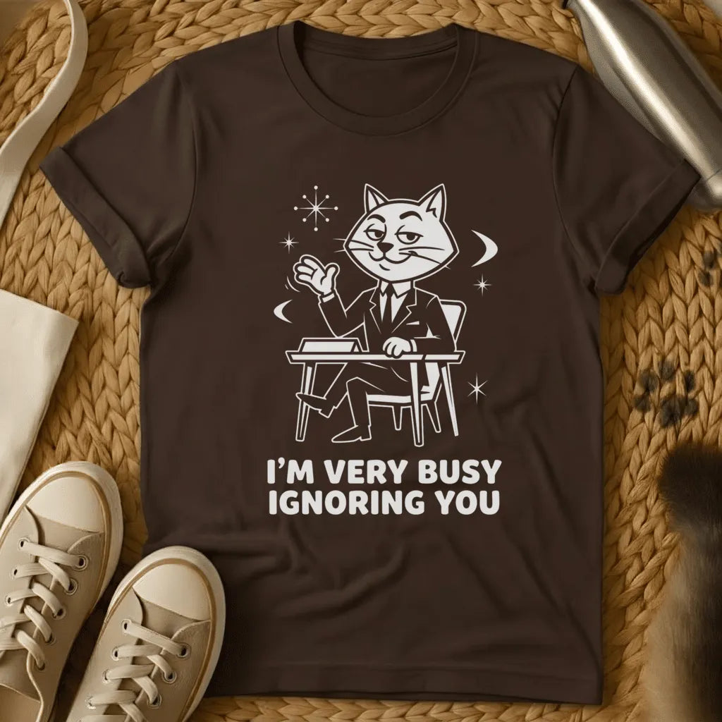 Dark Chocolate - Black t-shirt with vintage cartoon cat at desk design and text reading "I'm Very Busy Ignoring You