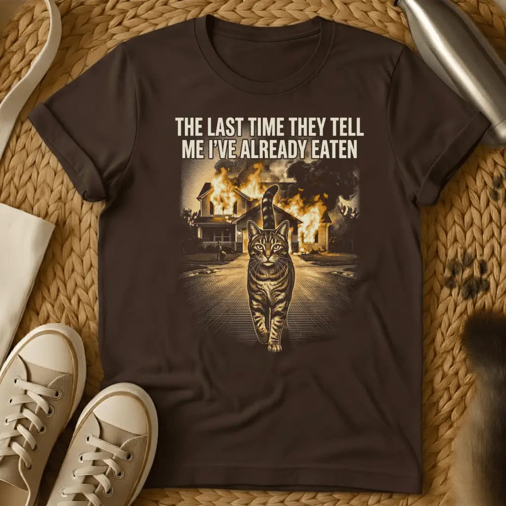 Dark Chocolate - Black t-shirt with cat walking away from burning house and text "THE LAST TIME THEY TELL ME I'VE ALREADY EATEN" in humorous meme style