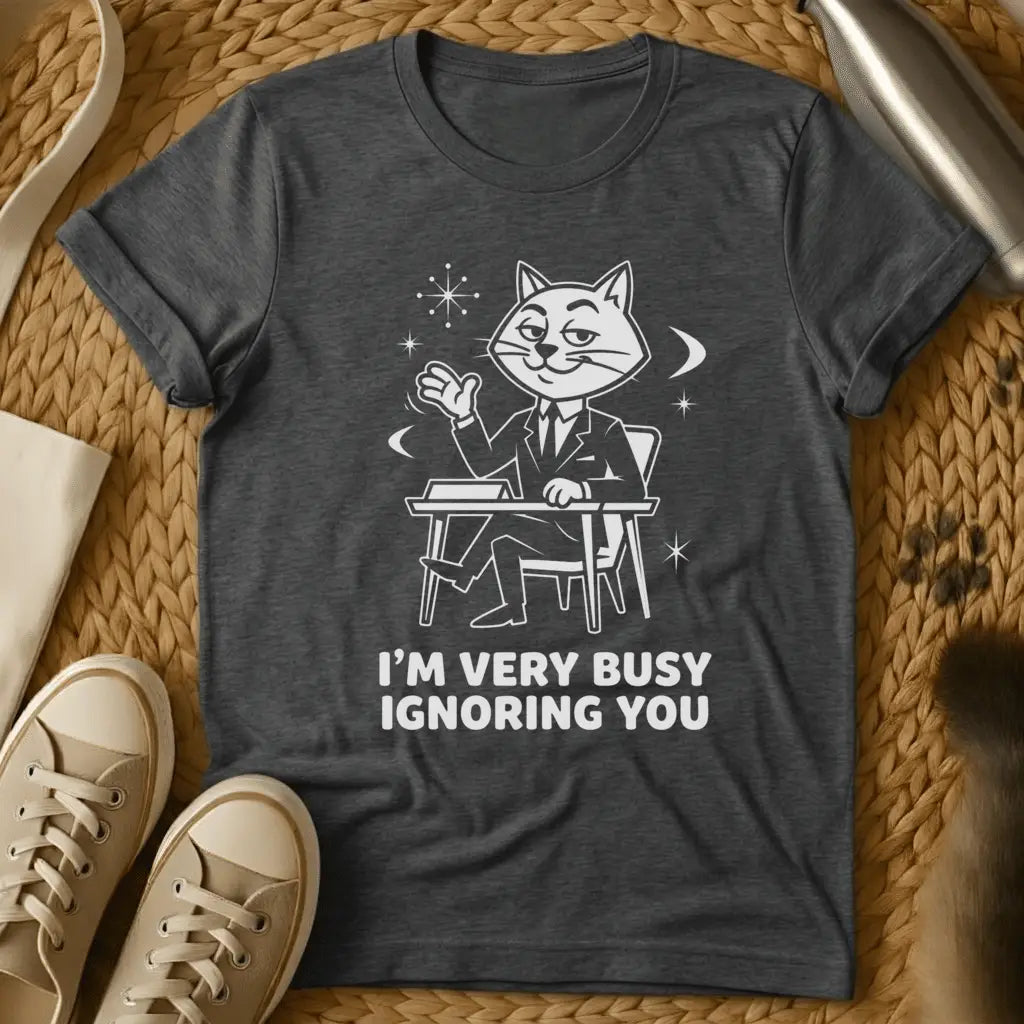 Dark Heather - Black t-shirt with vintage cartoon cat at desk design and text reading "I'm Very Busy Ignoring You
