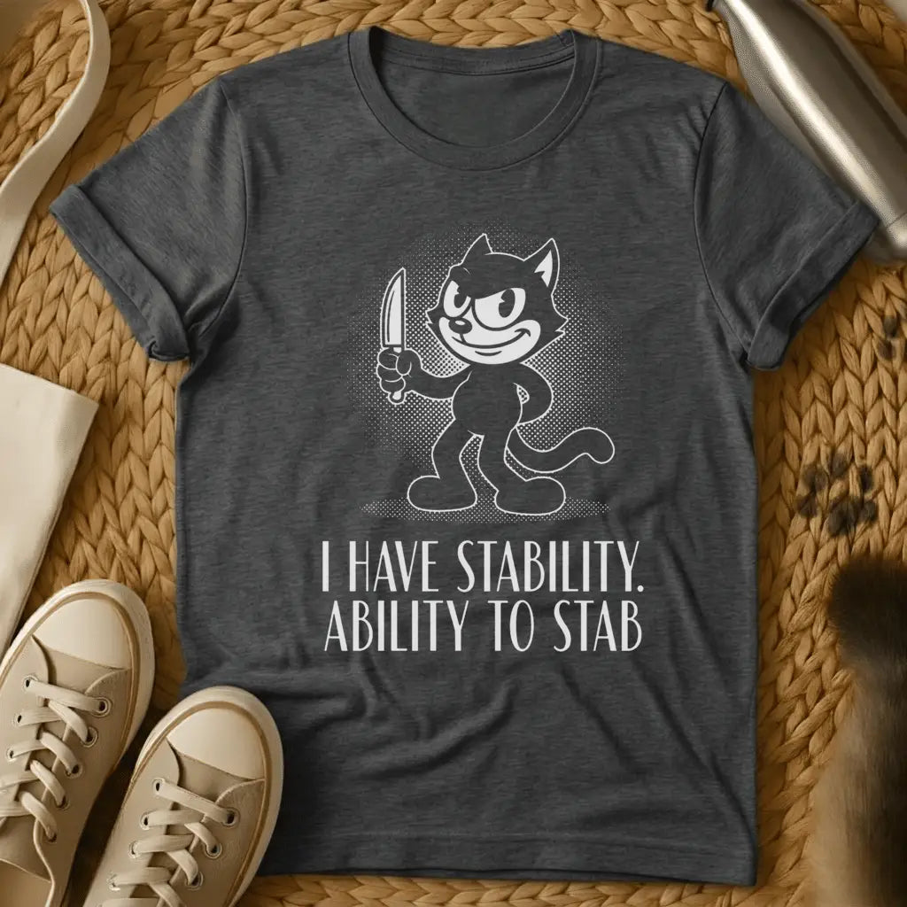 Dark Heather - Dark gray t-shirt featuring a retro cartoon cat character holding a knife with text reading "I HAVE STABILITY. ABILITY TO STAB