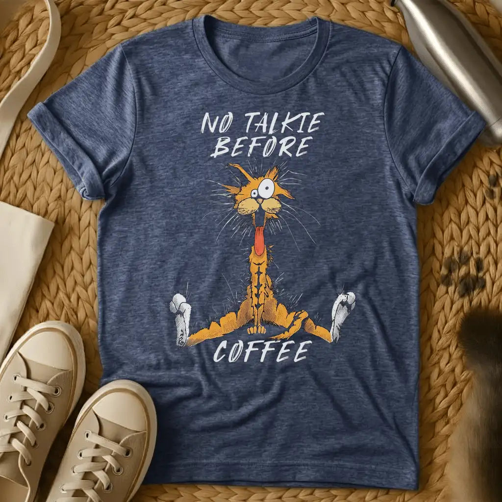 Heather Navy - Dark grey t-shirt with a wild-eyed frantic orange cartoon cat mouth open fur standing on end text reads No Talkie Before Coffee