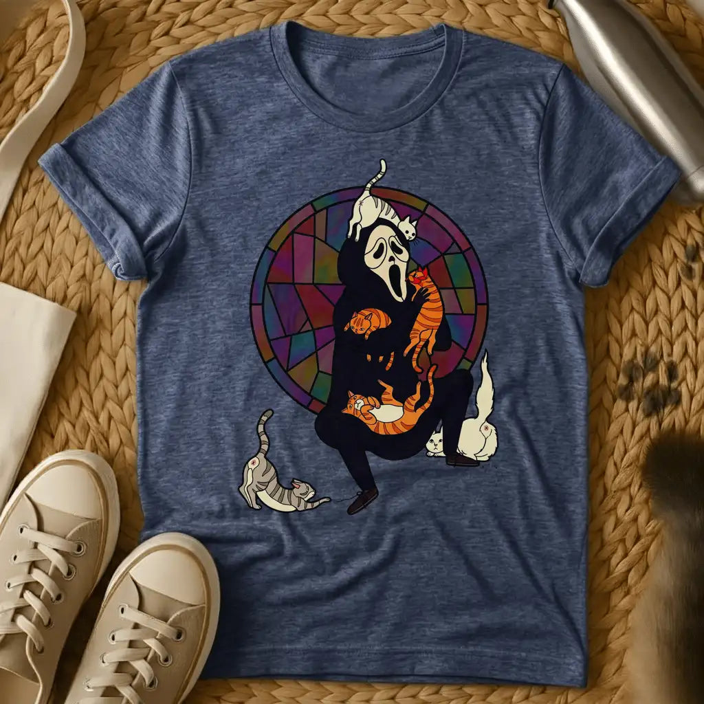 Heather Navy - Olive green t-shirt with a screaming ghost mask figure in black overwhelmed by multiple cats against a stained glass window backdrop