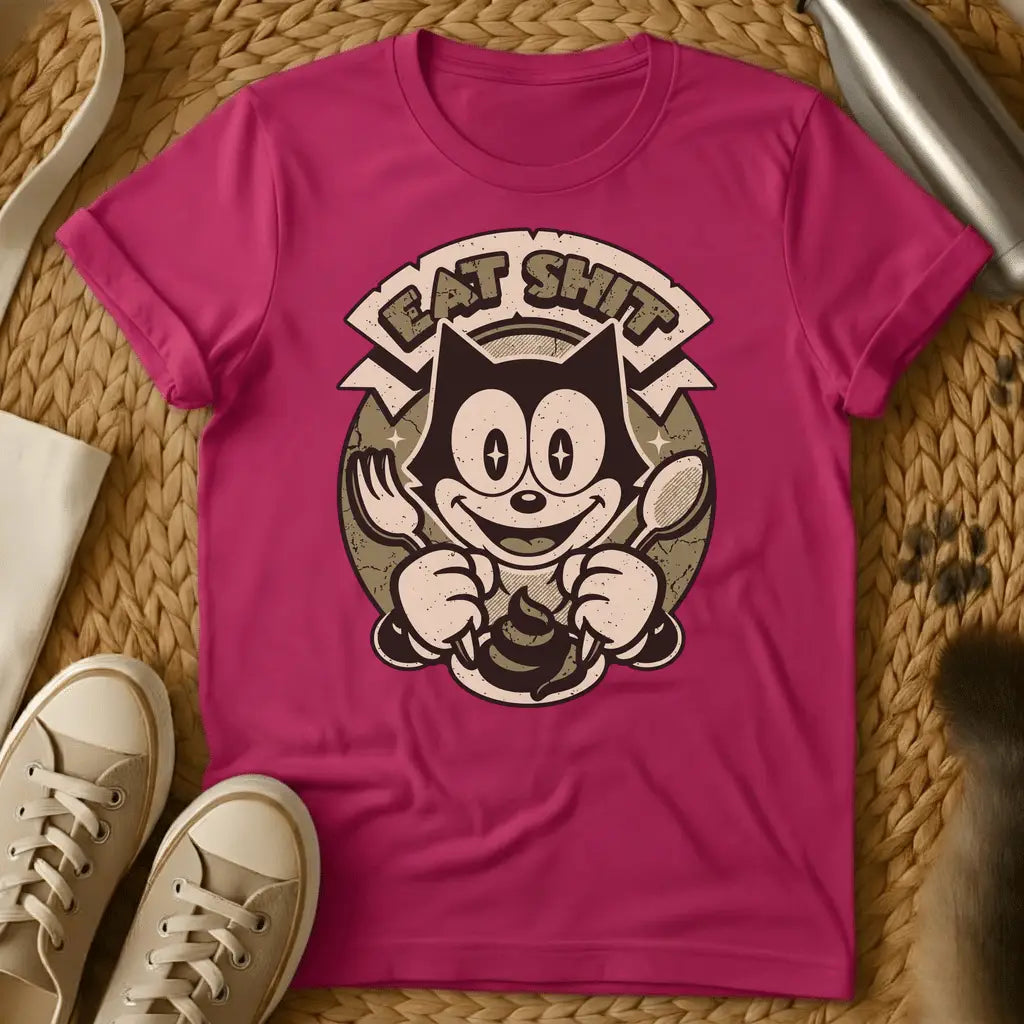 Heliconia - Dark grey t-shirt with a retro cartoon cat holding fork and spoon over a poop emoji with text reading Eat Shit in a vintage badge design
