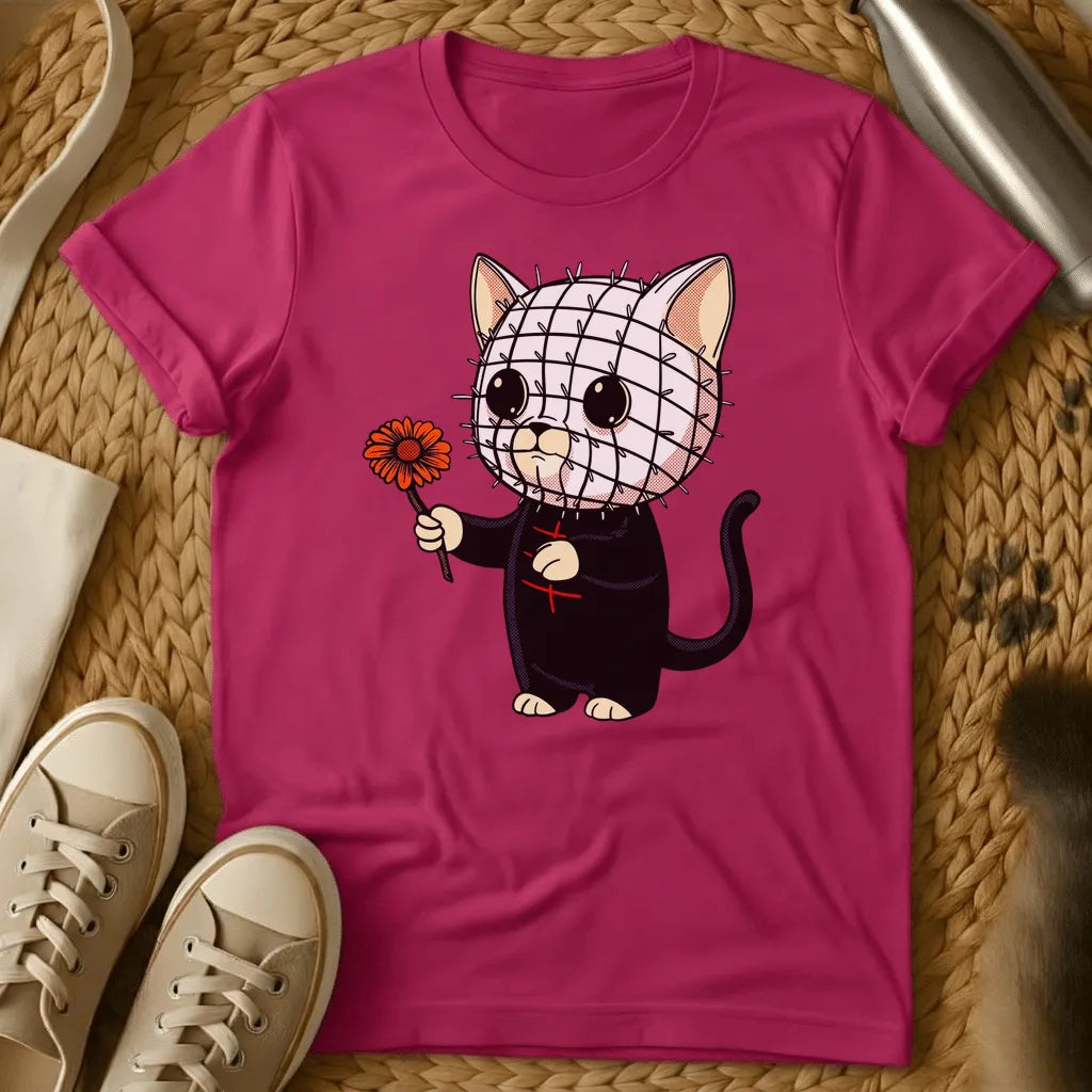 Heliconia - Gray t-shirt with kawaii cat cartoon, pin-covered stitched face, black outfit, holding orange daisy flower, horror parody art style
