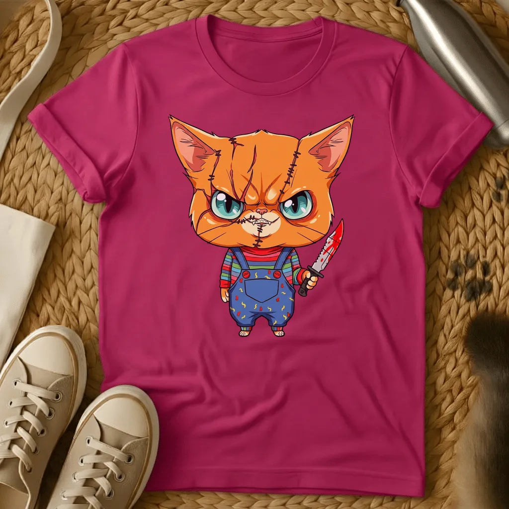 Heliconia - Olive green t-shirt with a chibi scarred orange tabby cat in striped shirt and overalls holding a bloody knife