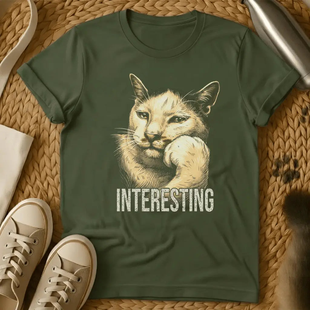 Military Green - Dark heather t-shirt with vintage engraving-style illustration of a cat resting chin on paw and the word INTERESTING below