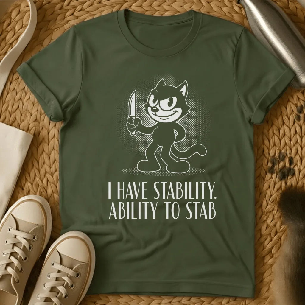 Military Green - Dark gray t-shirt featuring a retro cartoon cat character holding a knife with text reading "I HAVE STABILITY. ABILITY TO STAB