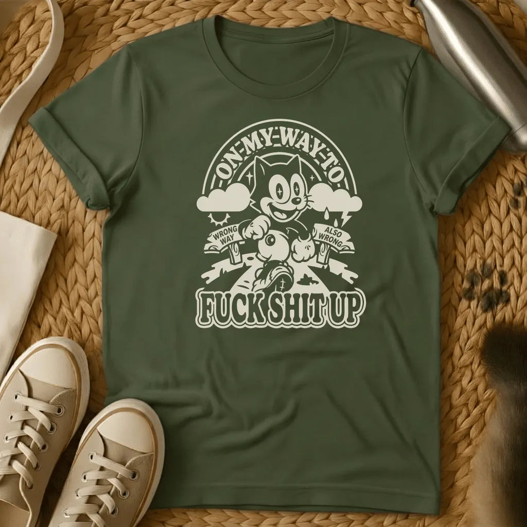 Military Green - Military green t-shirt with retro cartoon cat running on a forked road past Wrong Way and Also Wrong signs under a rainbow