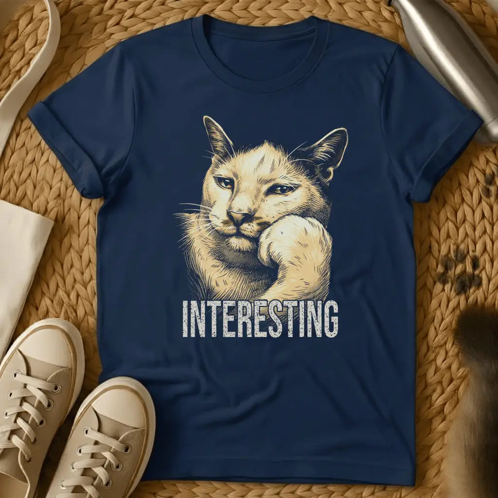Navy - Dark heather t-shirt with vintage engraving-style illustration of a cat resting chin on paw and the word INTERESTING below