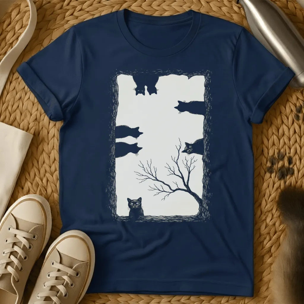Navy - Dark t-shirt with silhouette artwork of cats flying above a bare tree and cat watching below, black and white design