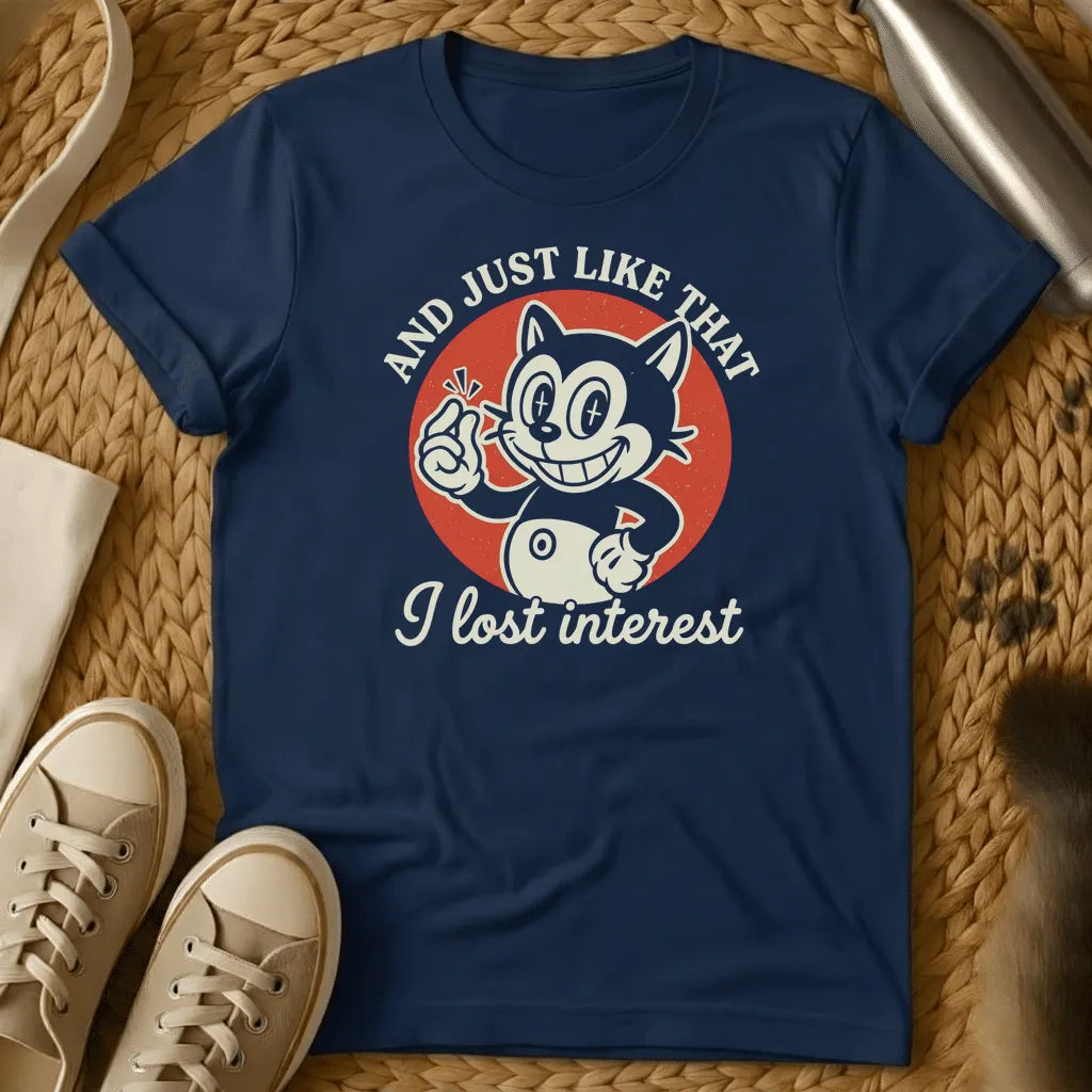 Navy - Dark heather t-shirt with vintage rubber-hose cartoon grinning cat snapping fingers on red circle, text reads And Just Like That I Lost Interest