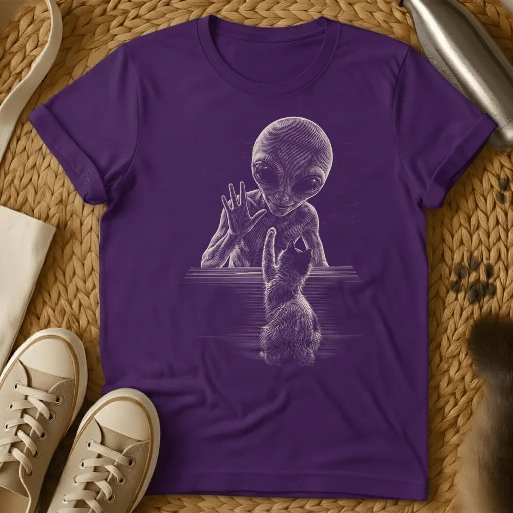 Purple - Dark grey t-shirt with monochrome engraving of a grey alien and fluffy cat reaching toward each other across a flat surface