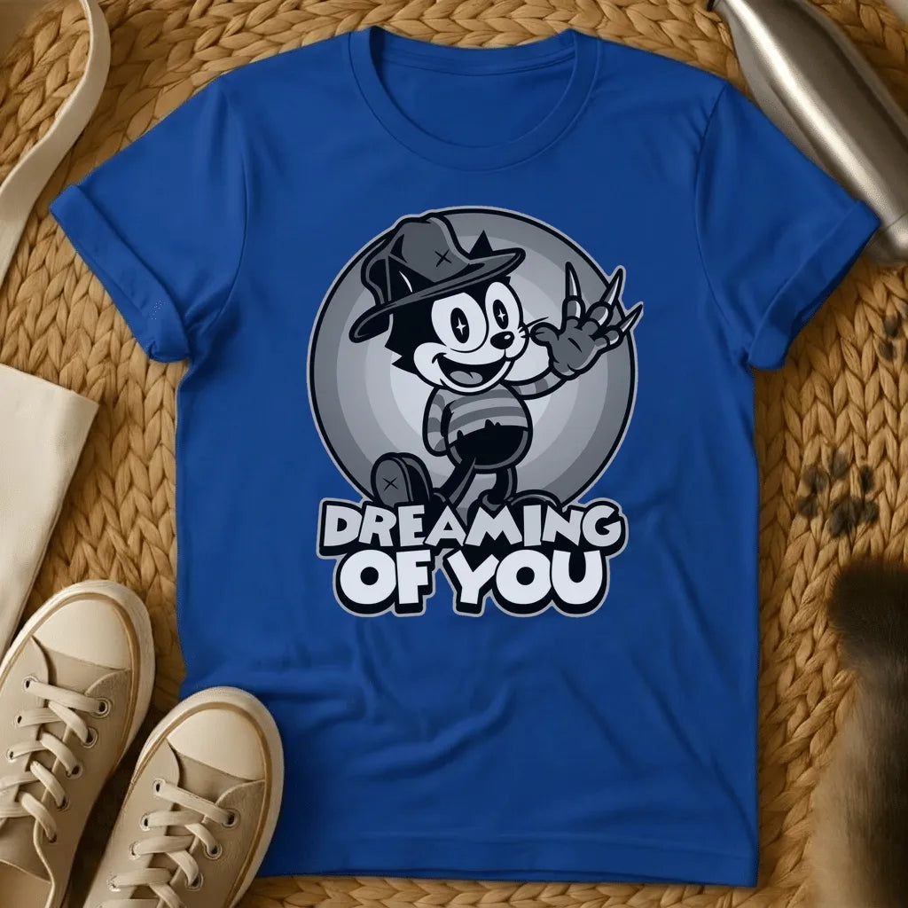 Royal - Vintage cartoon cat in cowboy hat waving in front of moon with "Dreaming of You" text on sage green t-shirt