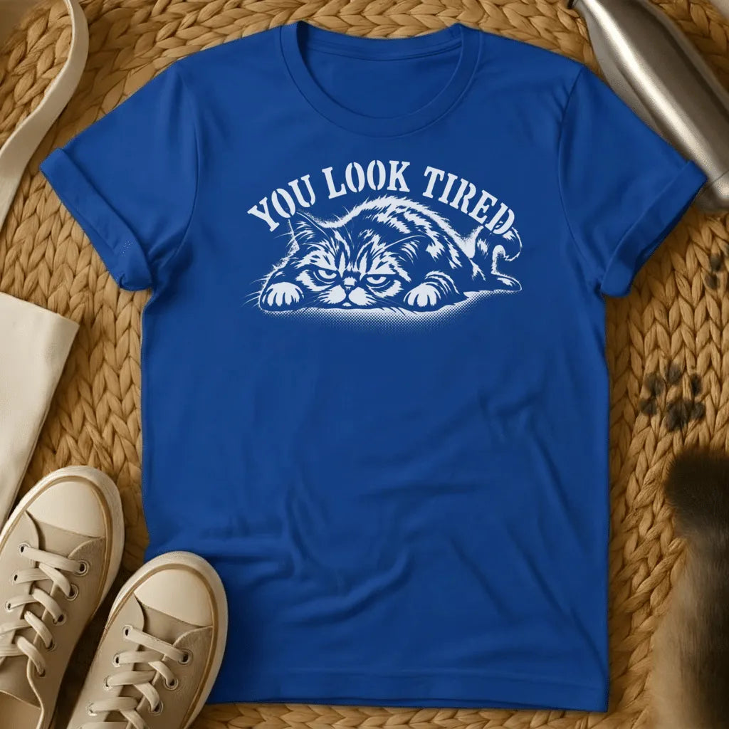 Royal - Dark heather grey t-shirt with a grumpy lounging cat woodcut illustration and arched text reading You Look Tired