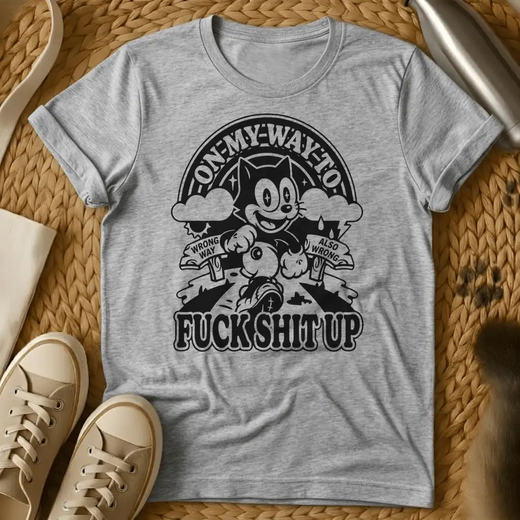 Sport Grey - Military green t-shirt with retro cartoon cat running on a forked road past Wrong Way and Also Wrong signs under a rainbow