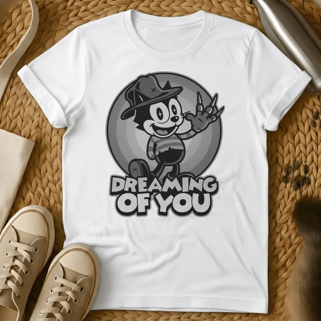 White - Vintage cartoon cat in cowboy hat waving in front of moon with "Dreaming of You" text on sage green t-shirt