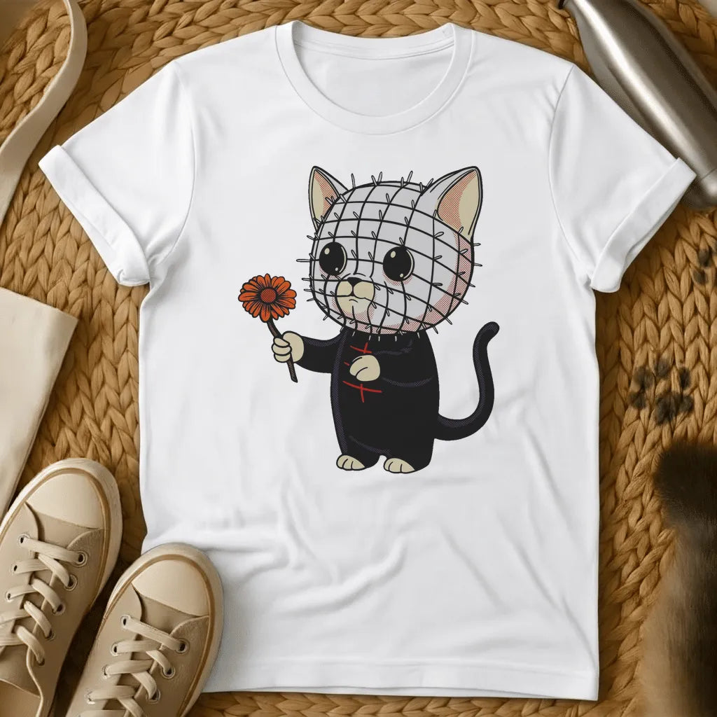 White - Gray t-shirt with kawaii cat cartoon, pin-covered stitched face, black outfit, holding orange daisy flower, horror parody art style